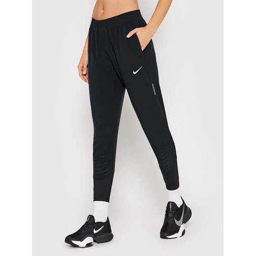 Nike Spodnie dresowe Swift CZ1115 Czarny Slim Fit Nike XL MODIVO