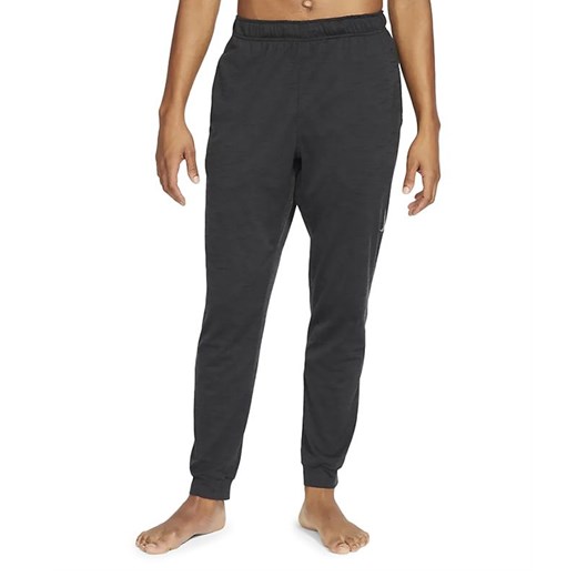 Spodnie dresowe Nike Yoga Dri-Fit CZ2208-010 - czarne ze sklepu streetstyle24.pl w kategorii Spodnie męskie - zdjęcie 137758079