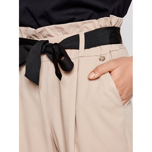 Rinascimento Spodnie materiałowe CFC0102131003 Beżowy Slim Fit Rinascimento XS MODIVO okazyjna cena