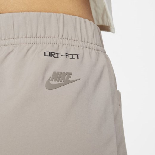 Damskie spodnie z tkaniny z wysokim stanem Nike Sportswear Dri-FIT Tech Pack - Nike L Nike poland