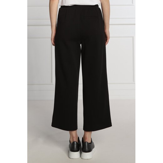 Calvin Klein Spodnie dresowe | flare fit Calvin Klein M Gomez Fashion Store