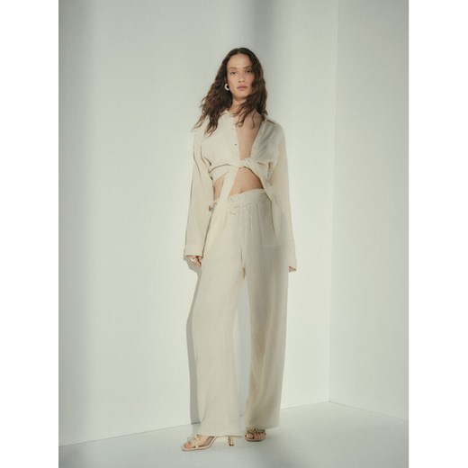 Mango Spodnie materiałowe Bambula 37031289 Beżowy Regular Fit Mango M MODIVO
