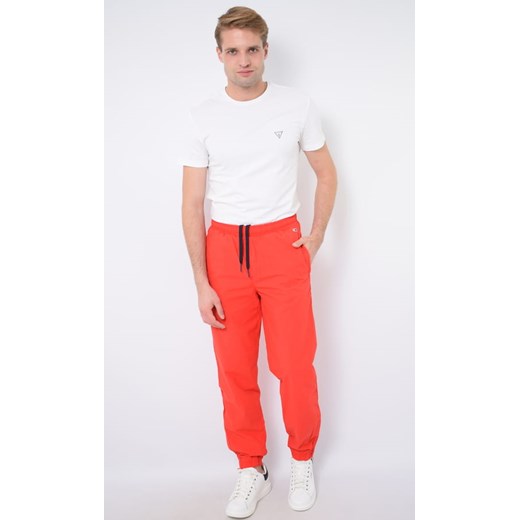 spodnie dresowe męskie tommy jeans dm0dm06600 czerwone ze sklepu Royal Shop w kategorii Spodnie męskie - zdjęcie 141563929