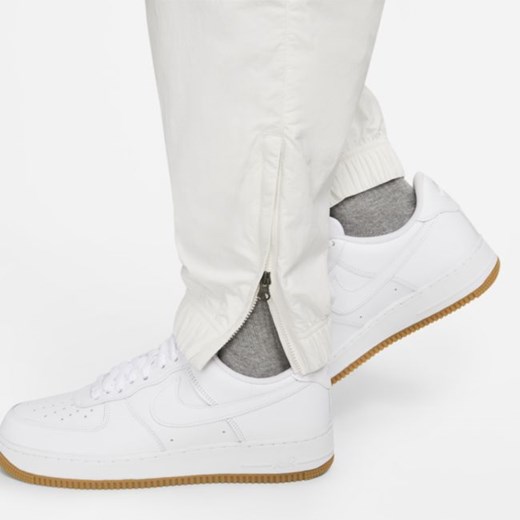 Męskie spodnie dresowe Nike Sportswear Solo Swoosh - Szary Nike S Nike poland