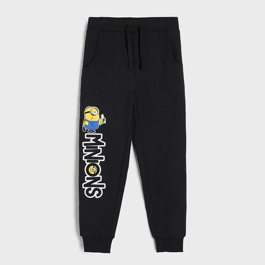 Sinsay - Spodnie dresowe jogger Minionki - Czarny Sinsay 122 Sinsay