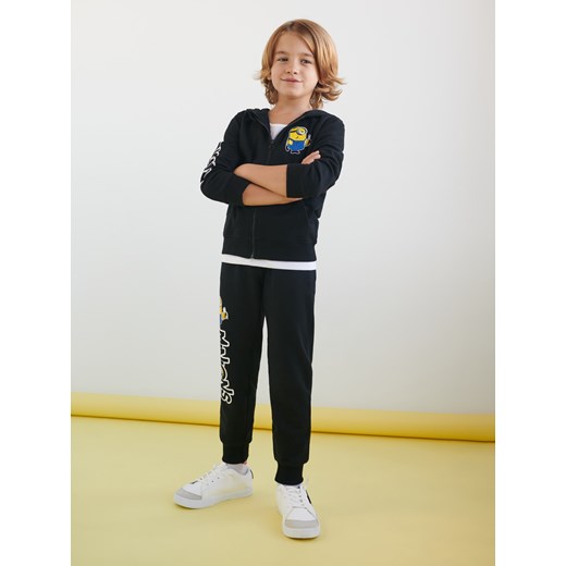 Sinsay - Spodnie dresowe jogger Minionki - Czarny Sinsay 104 Sinsay
