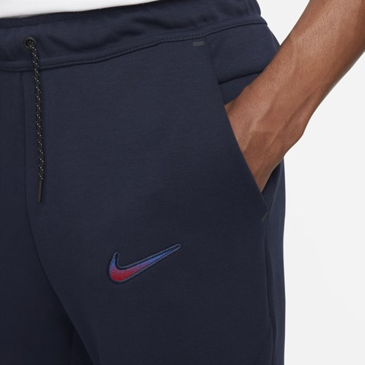 Męskie spodnie typu jogger FC Barcelona Tech Fleece - Niebieski Nike M Nike poland