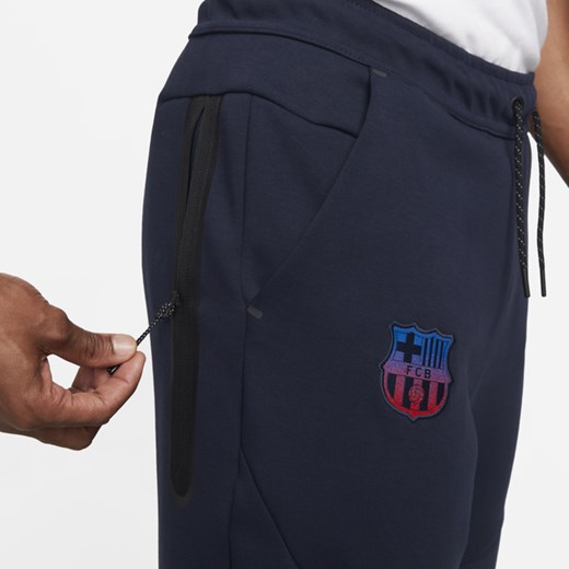 Męskie spodnie typu jogger FC Barcelona Tech Fleece - Niebieski Nike L Nike poland