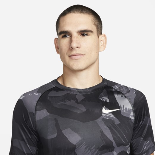 Męska dopasowana koszulka z krótkim rękawem i wzorem moro Nike Pro Dri-FIT - Nike L Nike poland