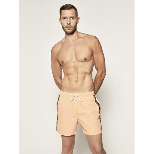 Calvin Klein Swimwear Szorty kąpielowe KM0KM00434 Pomarańczowy Regular Fit L promocyjna cena MODIVO