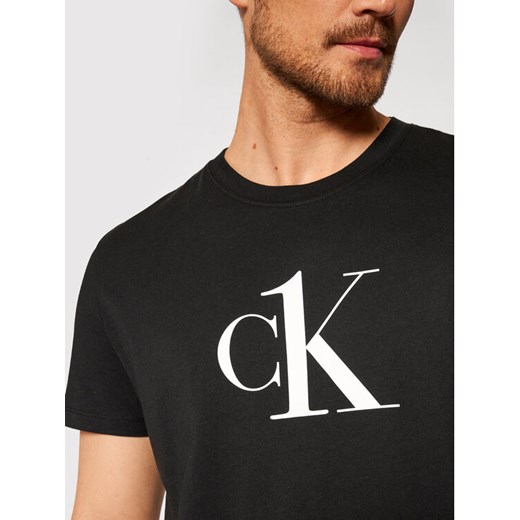 Calvin Klein Swimwear T-Shirt KM0KM00646 Czarny Relaxed Fit L promocyjna cena MODIVO