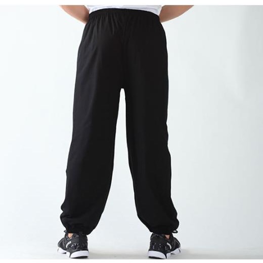 Luźne dresy z gumką przy nogawce - Czarny / S/M ze sklepu Valetta.pl w kategorii Spodnie męskie - zdjęcie 146020725