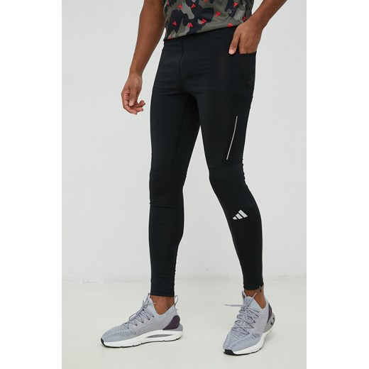 adidas Performance legginsy do biegania Own the Run męskie kolor czarny gładkie HM8444 ze sklepu ANSWEAR.com w kategorii Spodnie męskie - zdjęcie 148276356