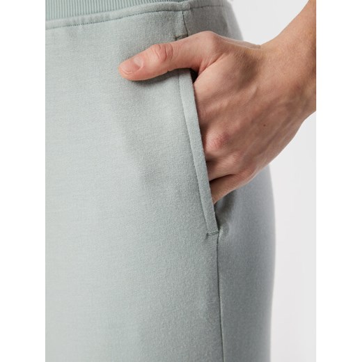 Calvin Klein Performance Spodnie dresowe 00GWF2P611 Zielony Slim Fit XS wyprzedaż MODIVO