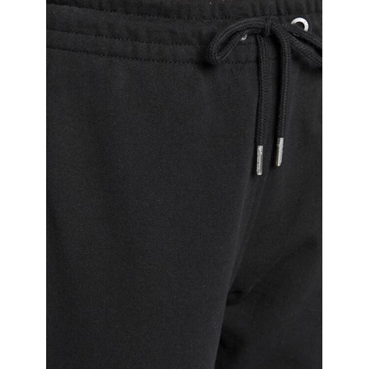 Calvin Klein Jeans Spodnie dresowe J20J219737 Czarny Relaxed Fit M promocyjna cena MODIVO