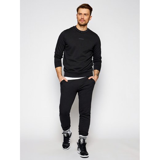 Calvin Klein Jeans Spodnie dresowe J30J317196 Czarny Regular Fit S okazyjna cena MODIVO