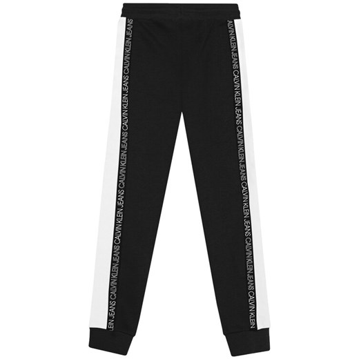 Calvin Klein Jeans Spodnie dresowe Colour Block IB0IB00866 Czarny Regular Fit 10Y okazyjna cena MODIVO
