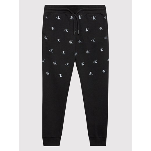 Calvin Klein Jeans Spodnie dresowe Repeated Monogram IB0IB01152 Czarny Regular 16 promocyjna cena MODIVO