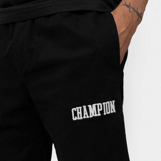 Czarne spodnie męskie Champion jesienne z tkaniny 