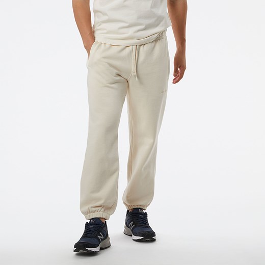Spodnie męskie New Balance MP23551GIE – beżowe ze sklepu New Balance Poland w kategorii Spodnie męskie - zdjęcie 150873647