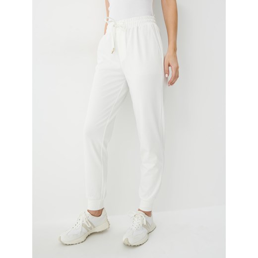 Mohito - Białe spodnie dresowe - kremowy ze sklepu Mohito w kategorii Spodnie damskie - zdjęcie 151069509