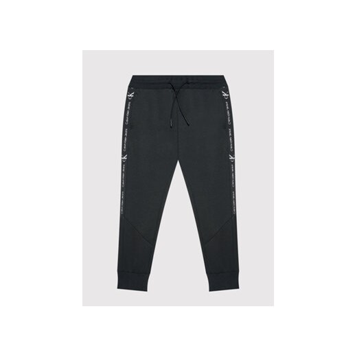 Calvin Klein Jeans Spodnie dresowe Punto Logo IB0IB01187 Czarny Regular Fit 6Y promocja MODIVO