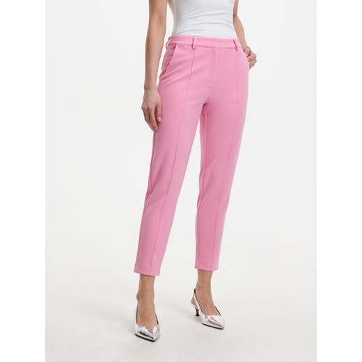 Różowe spodnie damskie Reserved 