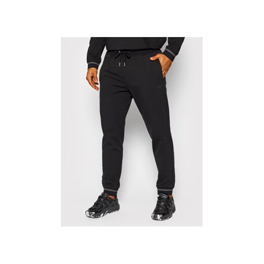 Guess Spodnie dresowe M1BB37 K7ON1 Czarny Slim Fit Guess XL MODIVO okazyjna cena