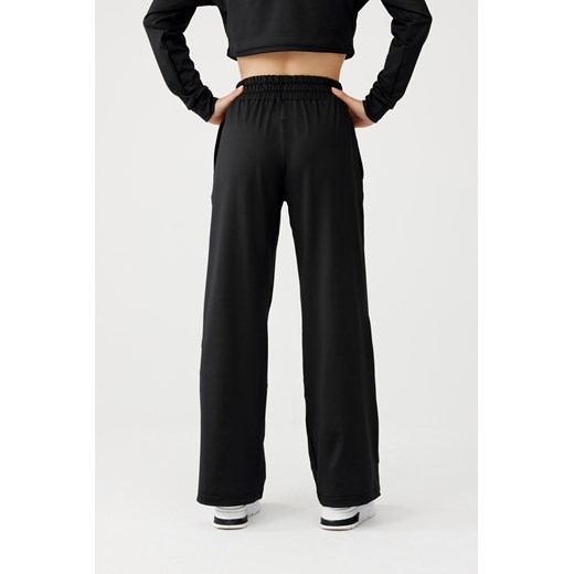 Damskie spodnie dresowe OLIMP LOOSE PANTS : Kolor - Czarny, Rozmiar - M Rough Radical M ROUGH RADICAL