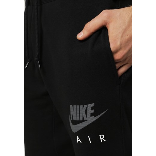 Nike Sportswear Spodnie treningowe black/dark grey zalando czarny materiałowe