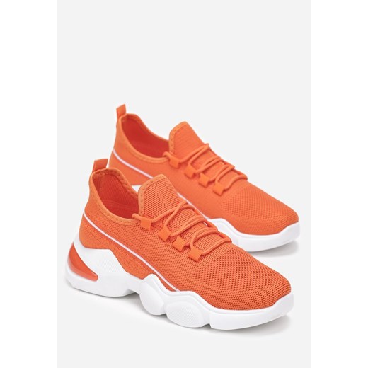 Buty sportowe damskie pomarańczowe Born2be na płaskiej podeszwie sznurowane 