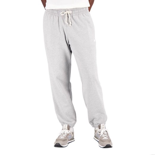 Spodnie dresowe New Balance MP31503AG - szare ze sklepu streetstyle24.pl w kategorii Spodnie męskie - zdjęcie 157129689