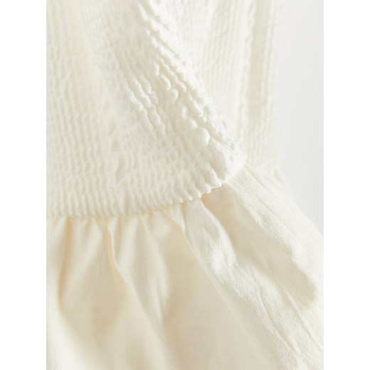 Bluzka damska biała Reserved z okrągłym dekoltem 
