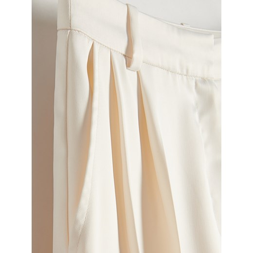 Spodnie damskie Reserved białe 