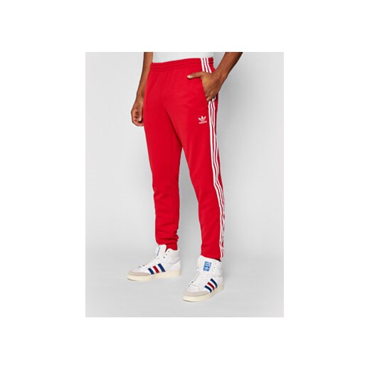 adidas Spodnie dresowe adicolor Classics GF0208 Czerwony Slim Fit L okazja MODIVO