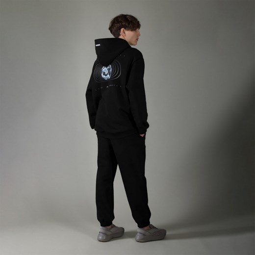 Męskie spodnie dresowe joggery 4F x Robert Lewandowski RL9SS23TTROM571 - czarne Rl9 XL Sportstylestory.com