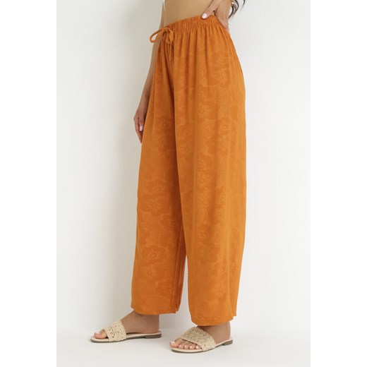 Pomarańczowe Szerokie Spodnie z Gumką w Pasie Roselika ze sklepu Born2be Odzież w kategorii Spodnie damskie - zdjęcie 159178439