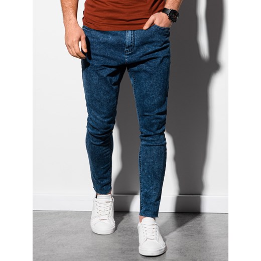Męskie spodnie jeansowe marmurkowe z surowo wykończoną nogawką SLIM FIT - ciemnoniebieskie V4 OM-PADP-0146 ze sklepu ombre w kategorii Jeansy męskie - zdjęcie 159246517