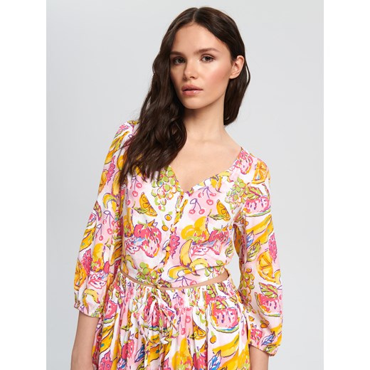 Bluzka damska Sinsay z dekoltem v z krótkim rękawem w kwiaty 