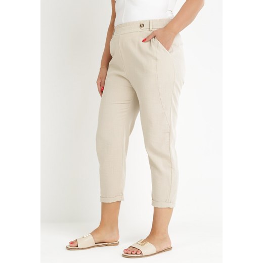 Jasnobeżowe Spodnie z Długimi Nogawkami i Gumką w Talii Nokash ze sklepu Born2be Odzież w kategorii Spodnie damskie - zdjęcie 159314128