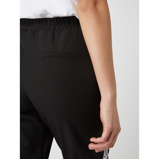 Spodnie sportowe z paskami w kontrastowym kolorze model ‘In girls we trust’ Oh April S Peek&Cloppenburg  okazja
