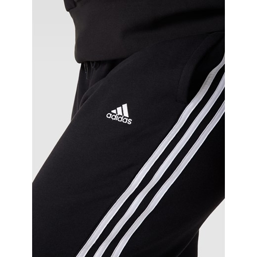 Spodnie dresowe PLUS SIZE z wyhaftowanym logo Adidas Sportswear Plus XXL Peek&Cloppenburg 