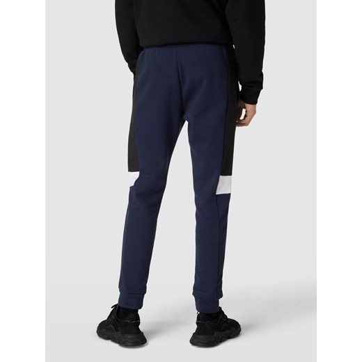Spodnie dresowe z nadrukiem z logo Adidas Sportswear L promocja Peek&Cloppenburg 