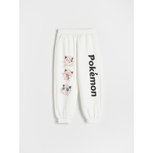 Reserved - Spodnie dresowe Pokemon - biały ze sklepu Reserved w kategorii Spodnie dziewczęce - zdjęcie 160940328