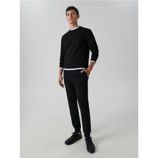 Sinsay - Spodnie dresowe jogger - czarny ze sklepu Sinsay w kategorii Spodnie męskie - zdjęcie 161209206