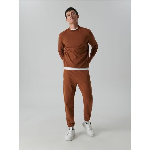 Sinsay - Spodnie dresowe jogger - pomarańczowy ze sklepu Sinsay w kategorii Spodnie męskie - zdjęcie 161209227