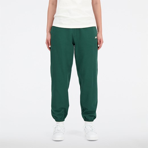 Spodnie damskie New Balance WP31503NWG – zielone ze sklepu New Balance Poland w kategorii Spodnie damskie - zdjęcie 161337128