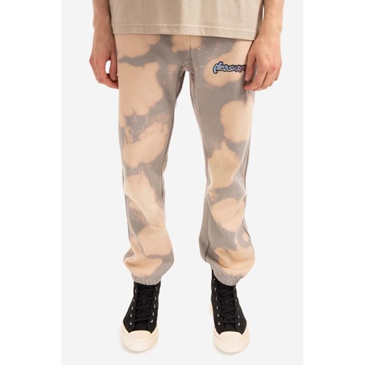 PLEASURES spodnie dresowe Decay kolor beżowy wzorzyste P22SP030-BLEACH P22SP030-BLEACH ze sklepu PRM w kategorii Spodnie męskie - zdjęcie 161399239