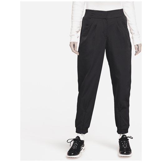 Damskie spodnie z wysokim stanem Nike Sportswear Dri-FIT Tech Pack - Czerń ze sklepu Nike poland w kategorii Spodnie damskie - zdjęcie 161525389