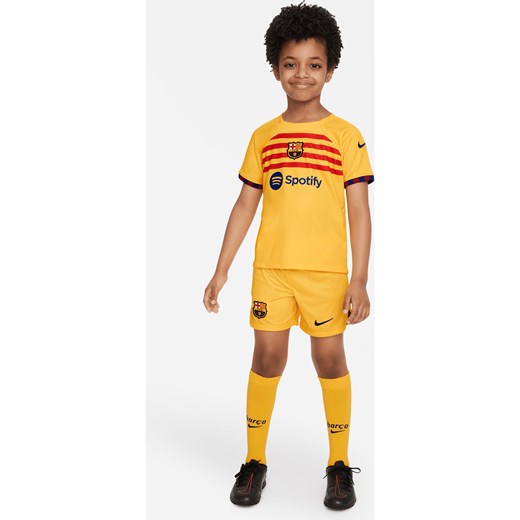 Strój piłkarski dla małych dzieci Nike FC Barcelona 2023/24 (wersja czwarta) - Żółty ze sklepu Nike poland w kategorii Komplety chłopięce - zdjęcie 161526617
